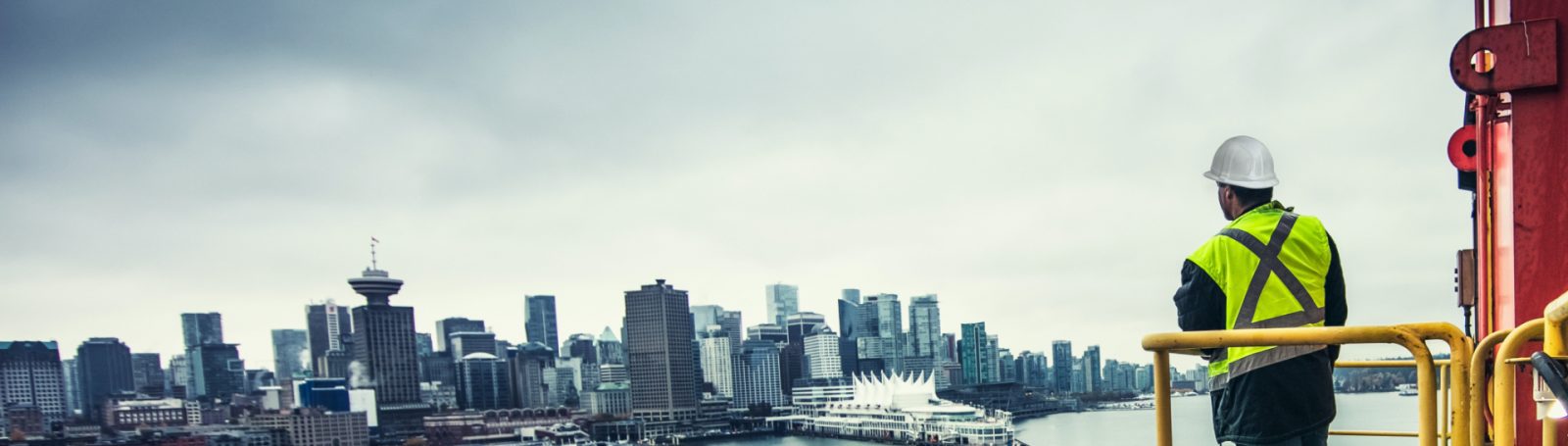 Man overlooking the Vancouver DP World Port